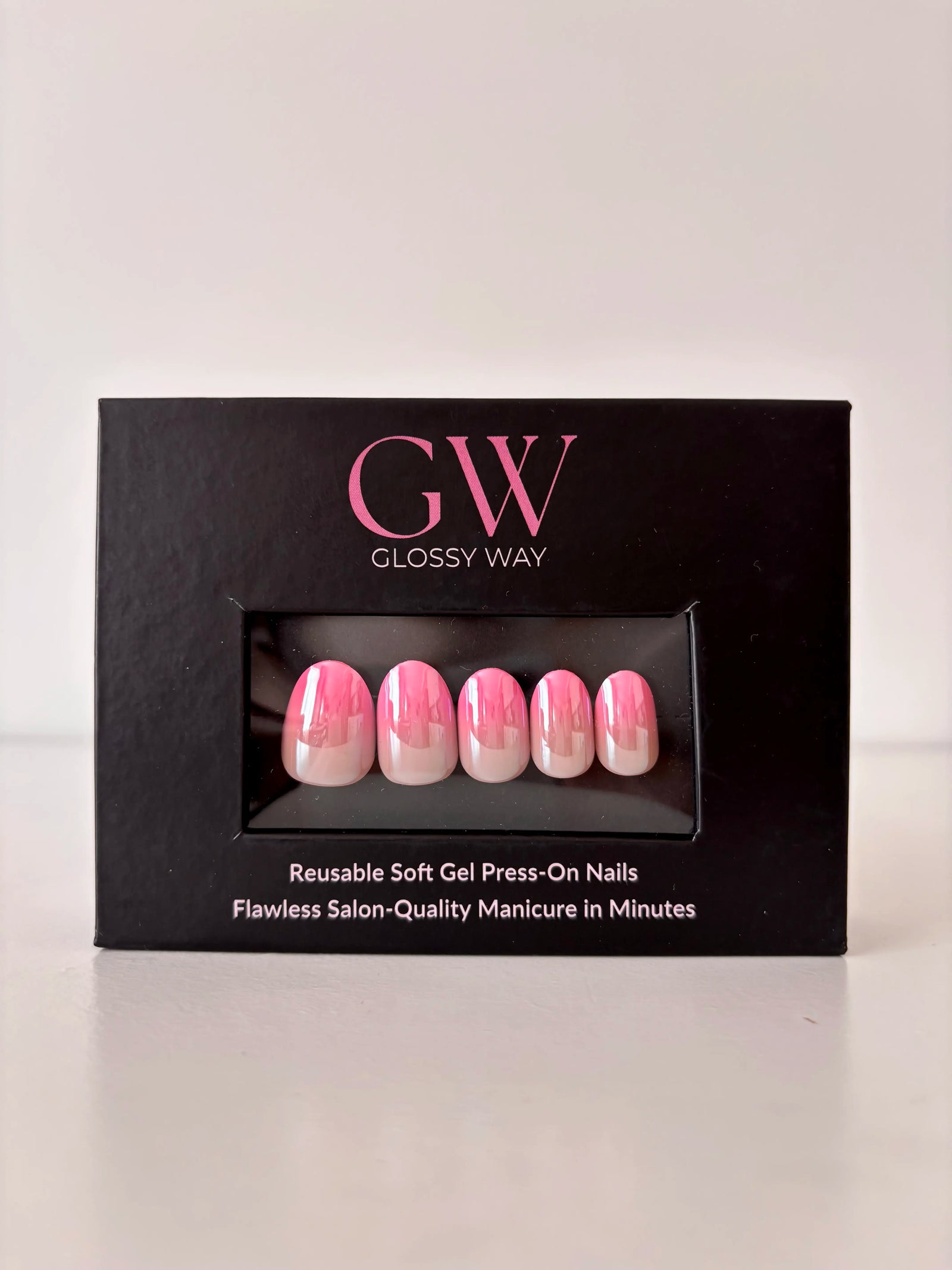 Aurora Pink Press-On Nails made by Glossy Way inside the original package.