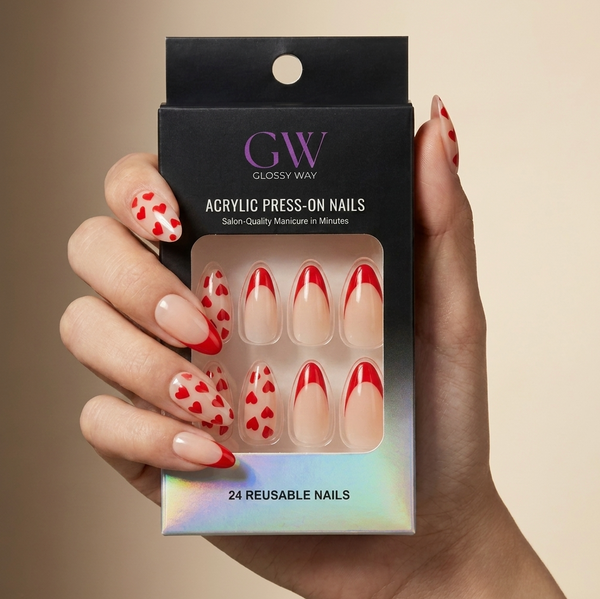 A hand holding a black glossy press-on nails box labeled GW Glossy Way, showing red-and-cream patterned reusable acrylic nails.