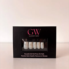 Lumière Press-On Nails made by Glossy Way inside the original package.