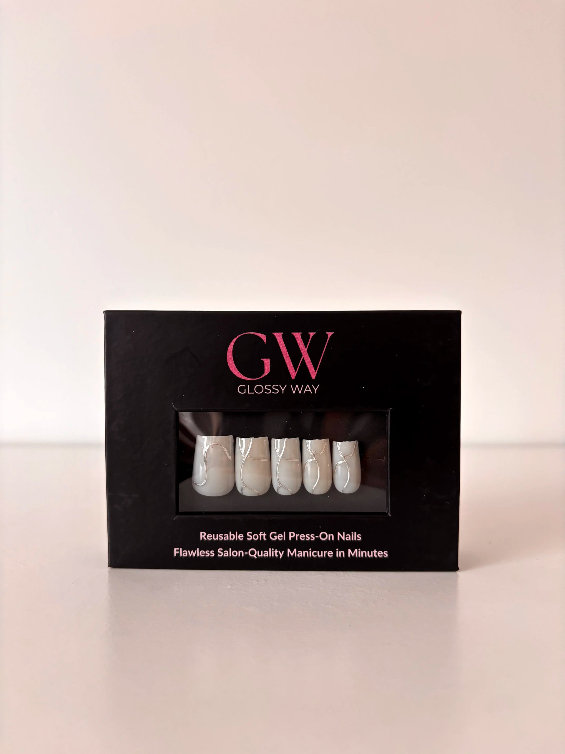 Lumière Press-On Nails made by Glossy Way inside the original package.