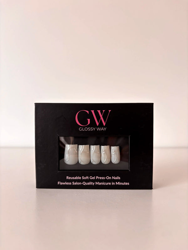 Lumière Press-On Nails made by Glossy Way inside the original package.
