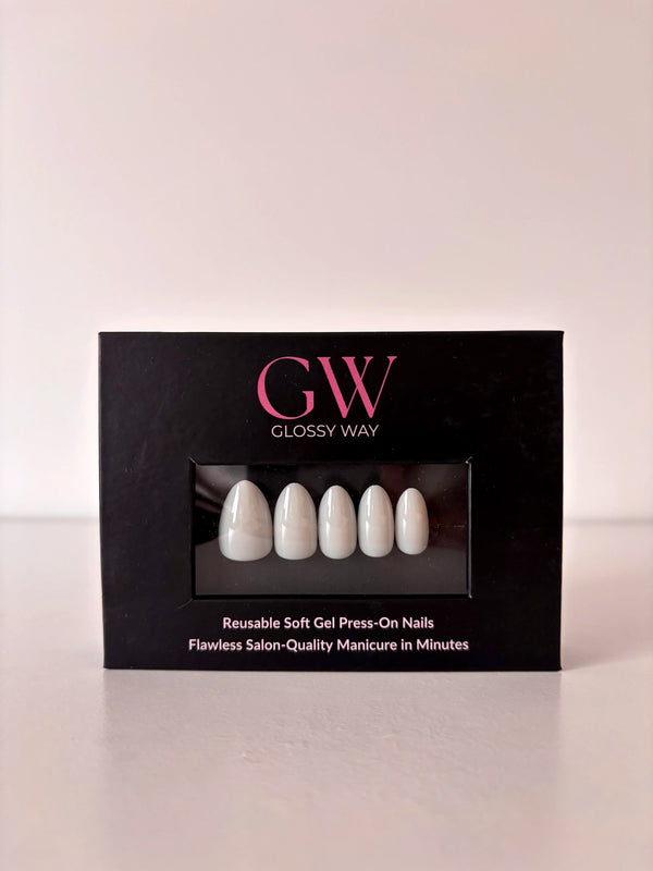 Moonlit Pearl white Press-On Nails made by Glossy Way inside the original package.