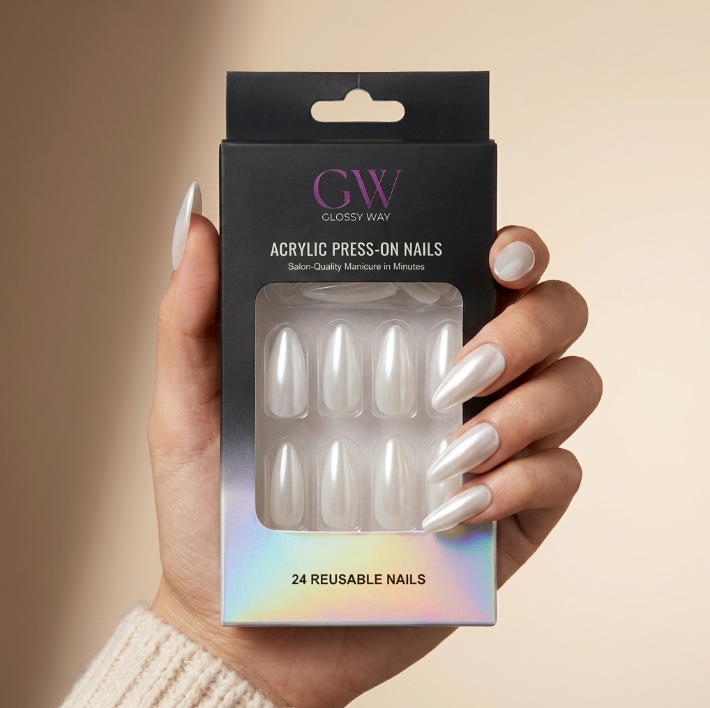 A hand with long, glossy white press-on nails holds a black retail box labeled 'GW Glossy Way Acrylic Press-On Nails' against a soft beige background.