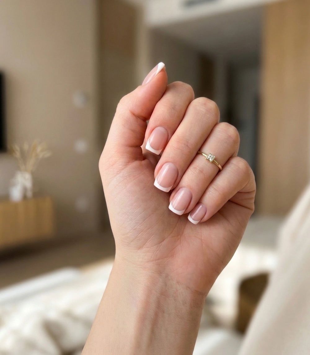 Picture of a woman hand with beautiful manicure after applying Glossy Way press-on nails