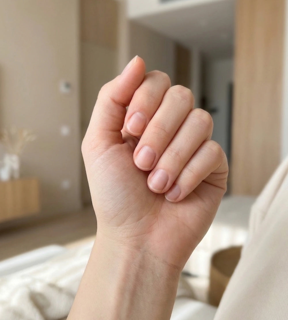 Picture of a woman hand with natural manicure before having nails done